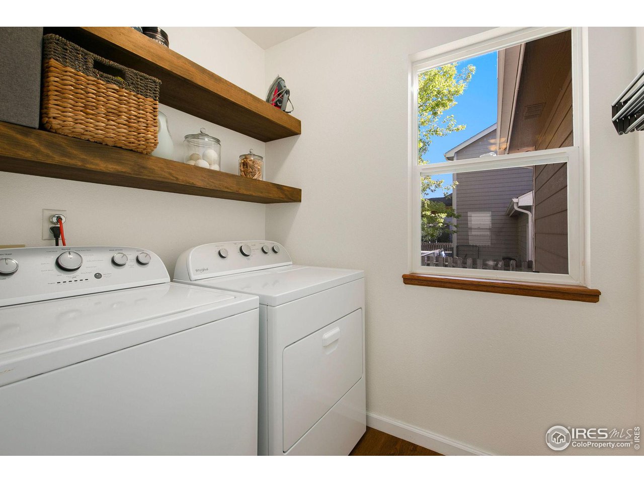 1138 Argento Drive Fort Collins, CO 80521 - Photo 12 of 25 a utility room with dryer and washer