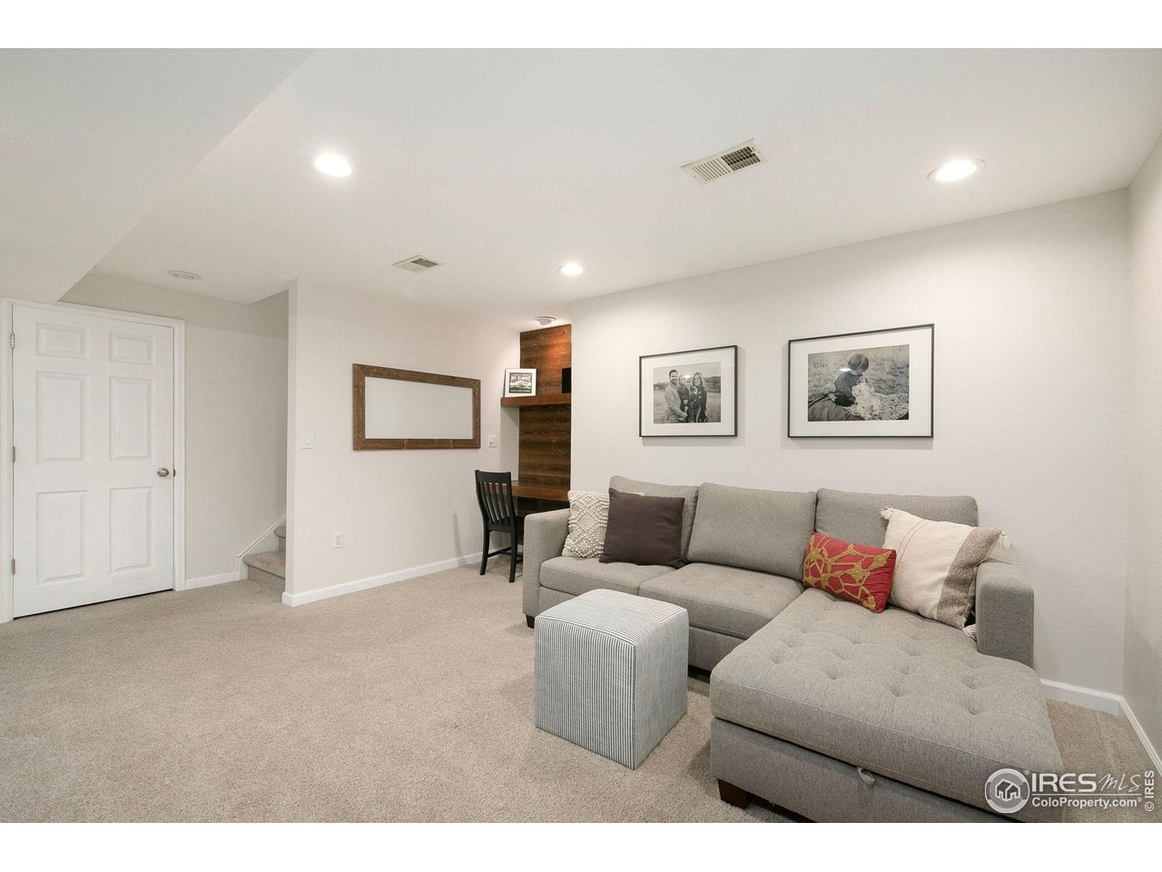 1138 Argento Drive Fort Collins, CO 80521 - Photo 19 of 25 a living room with furniture and a couch