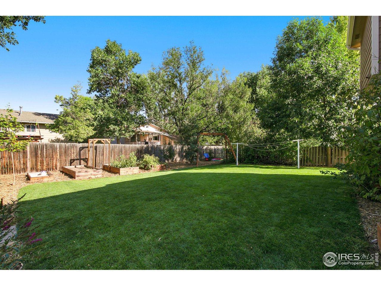 1138 Argento Drive Fort Collins, CO 80521 - Photo 25 of 25 a view of a park with a bench