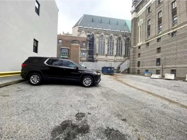 a car parked in front of a building
