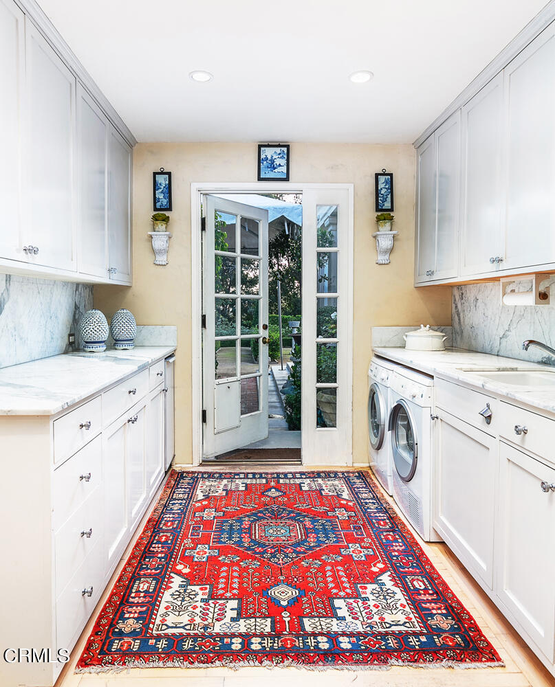 3 Oak Knoll Terrace Pasadena, CA 91106 - Photo 23 of 46 a view of a kitchen with fridge and wooden floor