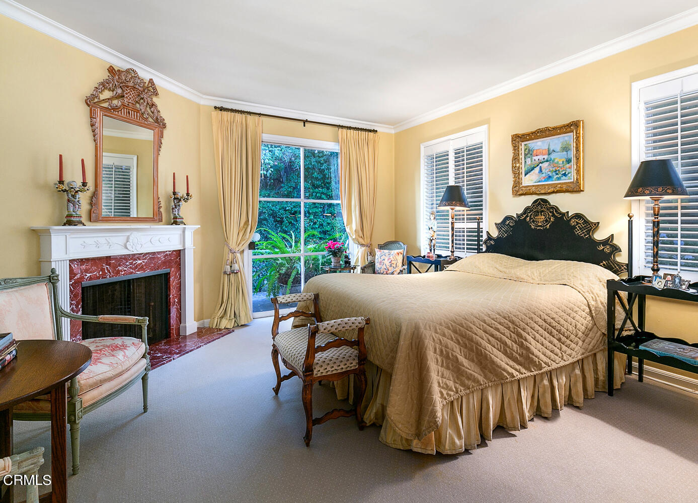 3 Oak Knoll Terrace Pasadena, CA 91106 - Photo 29 of 46 a spacious bedroom with a bed and a fireplace