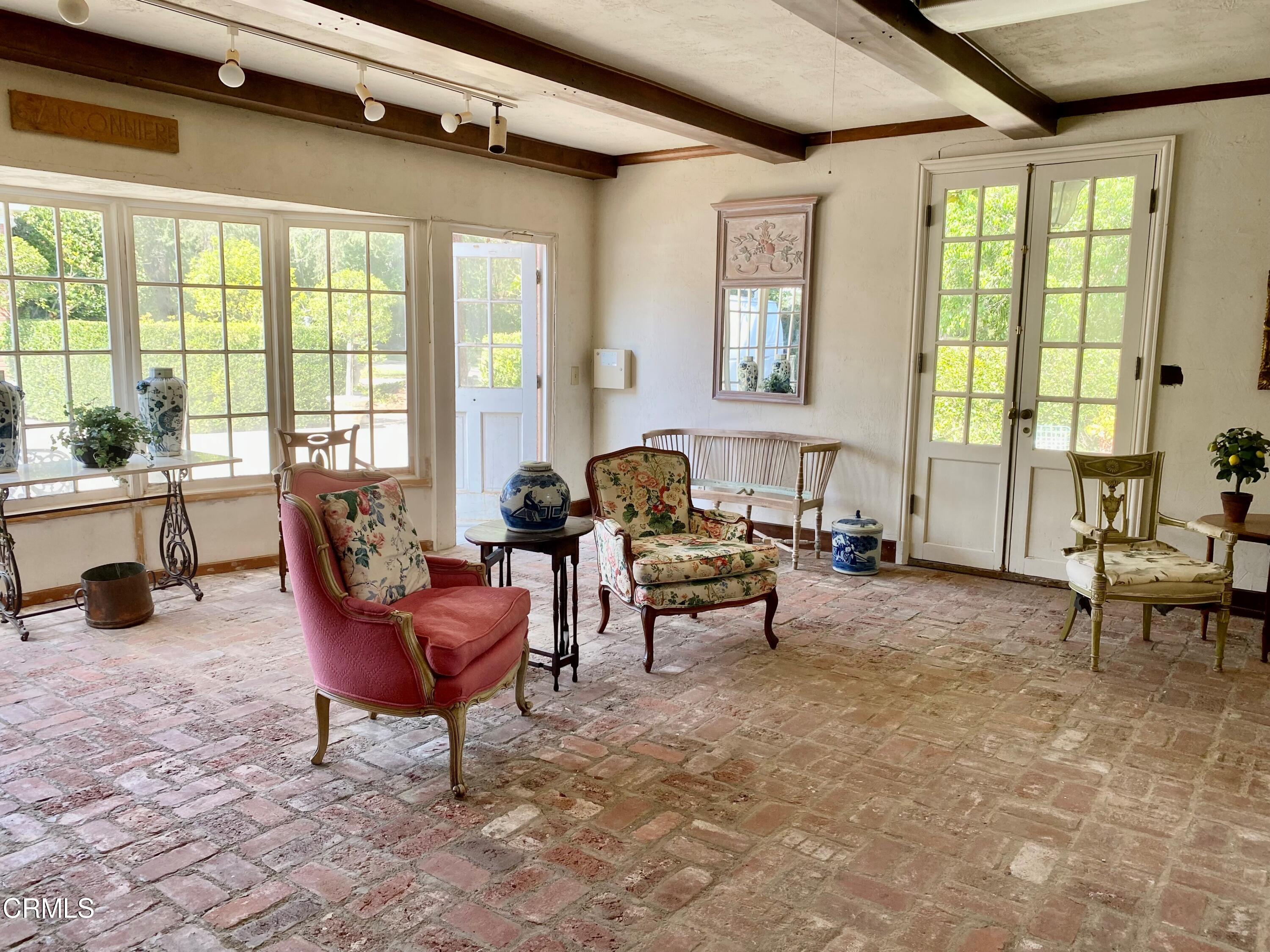 3 Oak Knoll Terrace Pasadena, CA 91106 - Photo 36 of 46 a living room with furniture and large windows