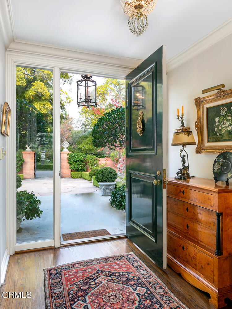3 Oak Knoll Terrace Pasadena, CA 91106 - Photo 4 of 46 a view of hallway with a floor to ceiling window and wooden floor