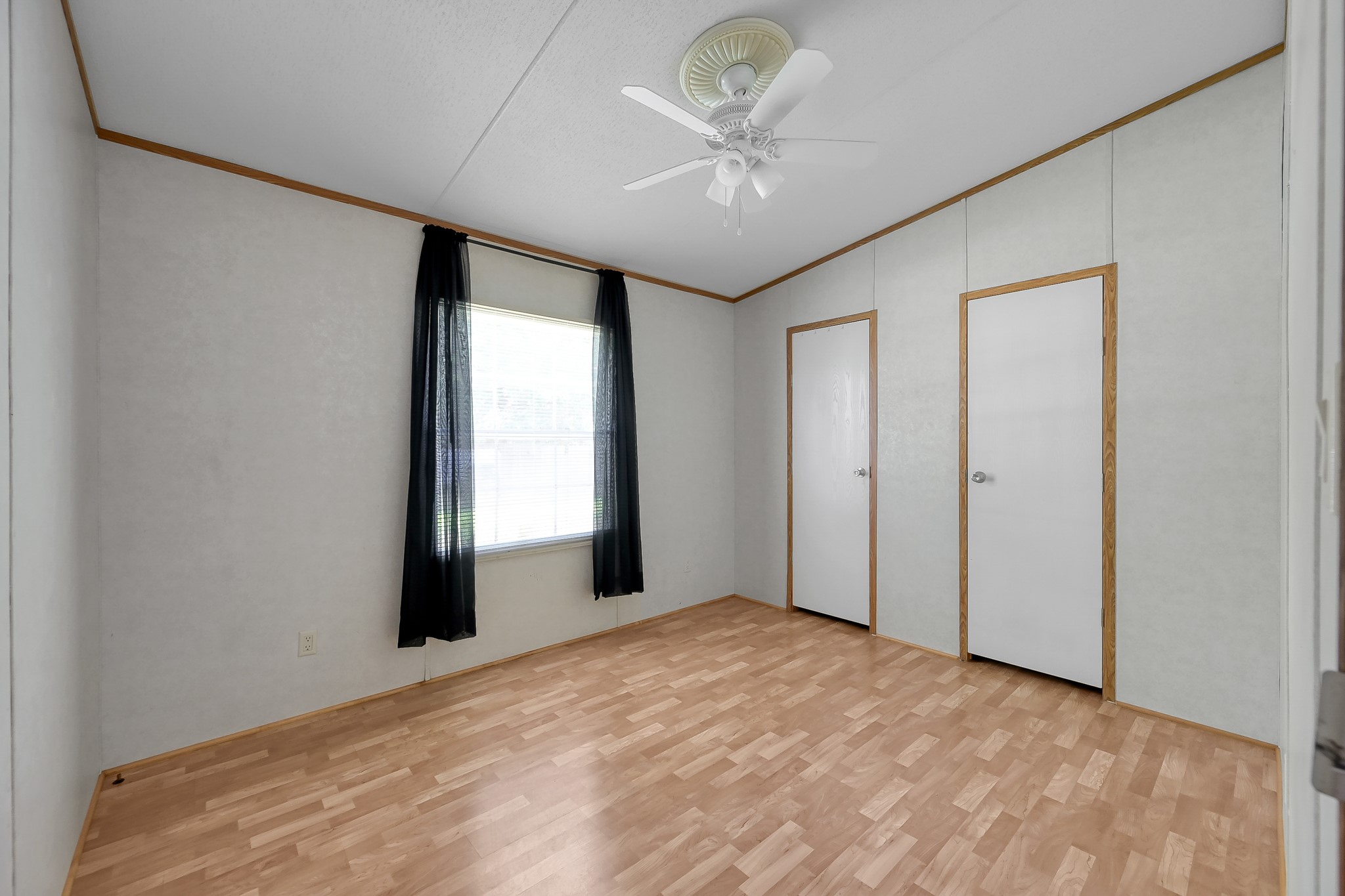 15350 Old Humble Pipeline Road Conroe, TX 77302 - Photo 17 of 38 a view of an empty room with a window