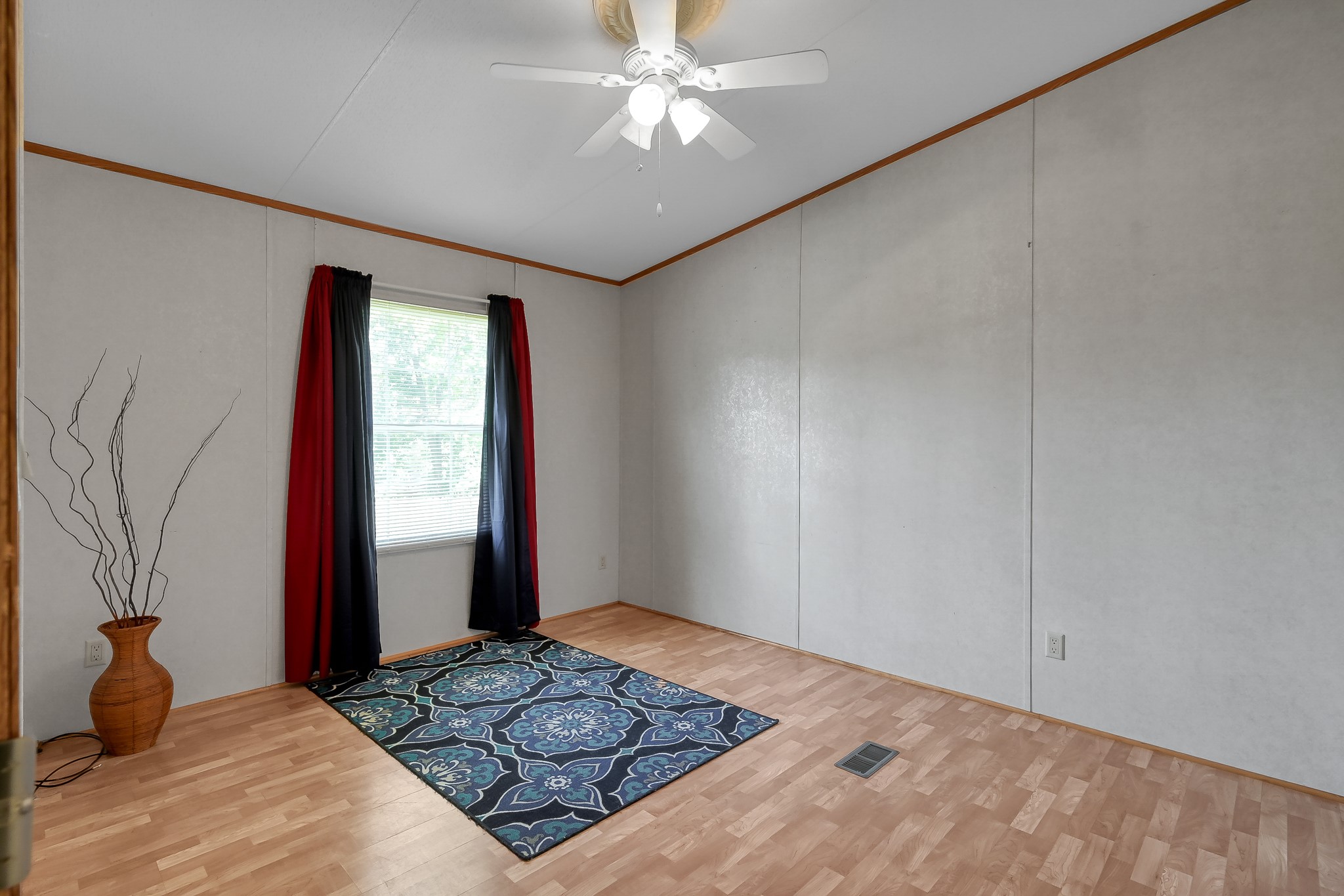 15350 Old Humble Pipeline Road Conroe, TX 77302 - Photo 22 of 38 a bedroom with a bed and a window