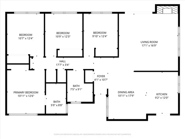 a front view of a house with seating space
