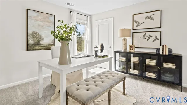 a vase of flowers sitting on a table