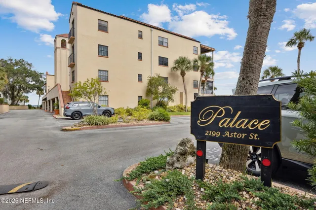 a front view of a building with many windows