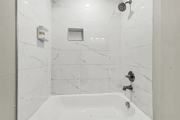 a bathroom with a bathtub
