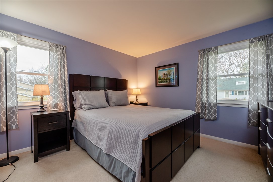 105 Frederick Drive Gates, NY 14624 - Photo 21 of 40 Bright and airy with two walls of nature light.