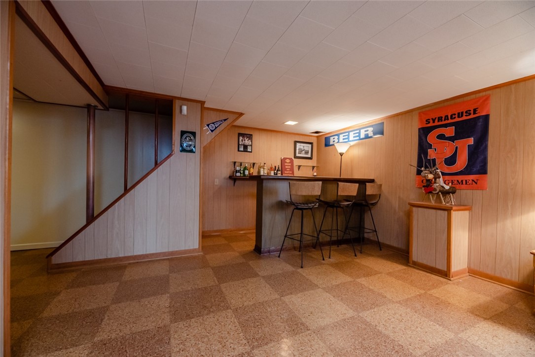 105 Frederick Drive Gates, NY 14624 - Photo 29 of 40 Take the party downstairs to the finished basement