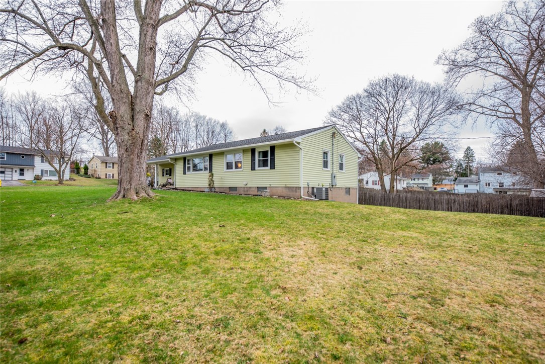 105 Frederick Drive Gates, NY 14624 - Photo 5 of 40 A large corner lot with mature trees just waiting