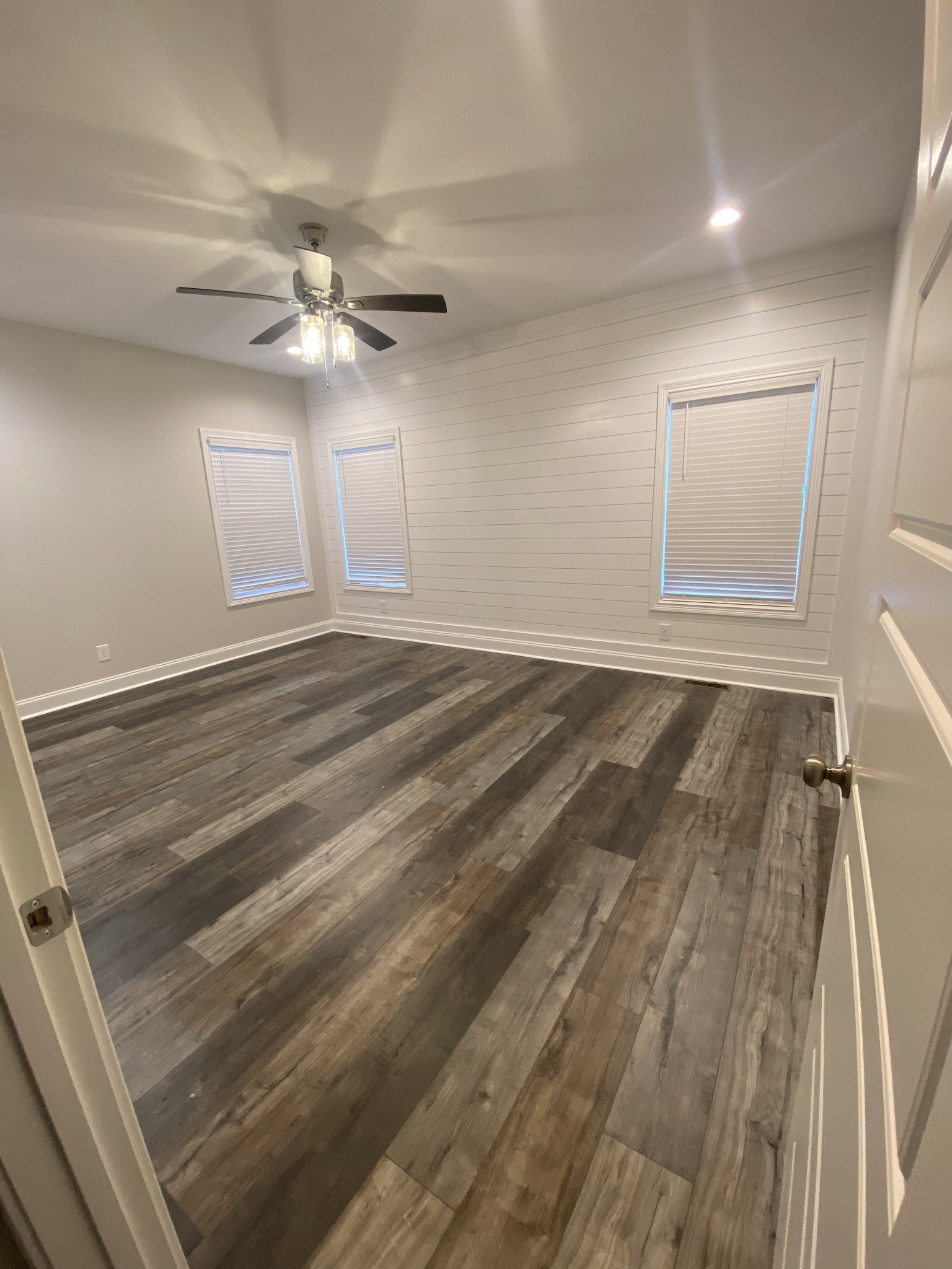 557 Dexter Drive Clarksville, TN 37043 - Photo 13 of 30 wooden floor in an empty room with a window