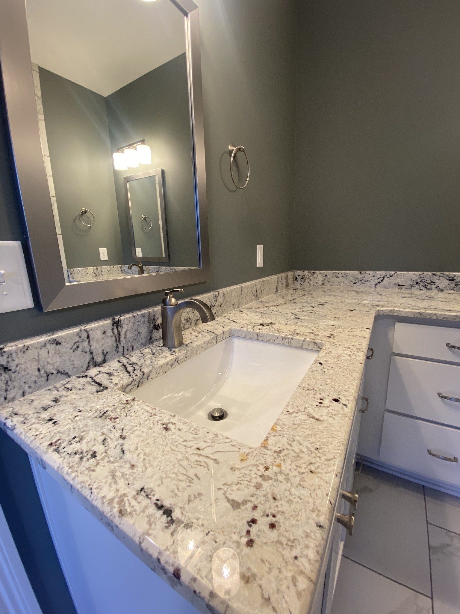 557 Dexter Drive Clarksville, TN 37043 - Photo 17 of 30 a bathroom with a sink and a mirror