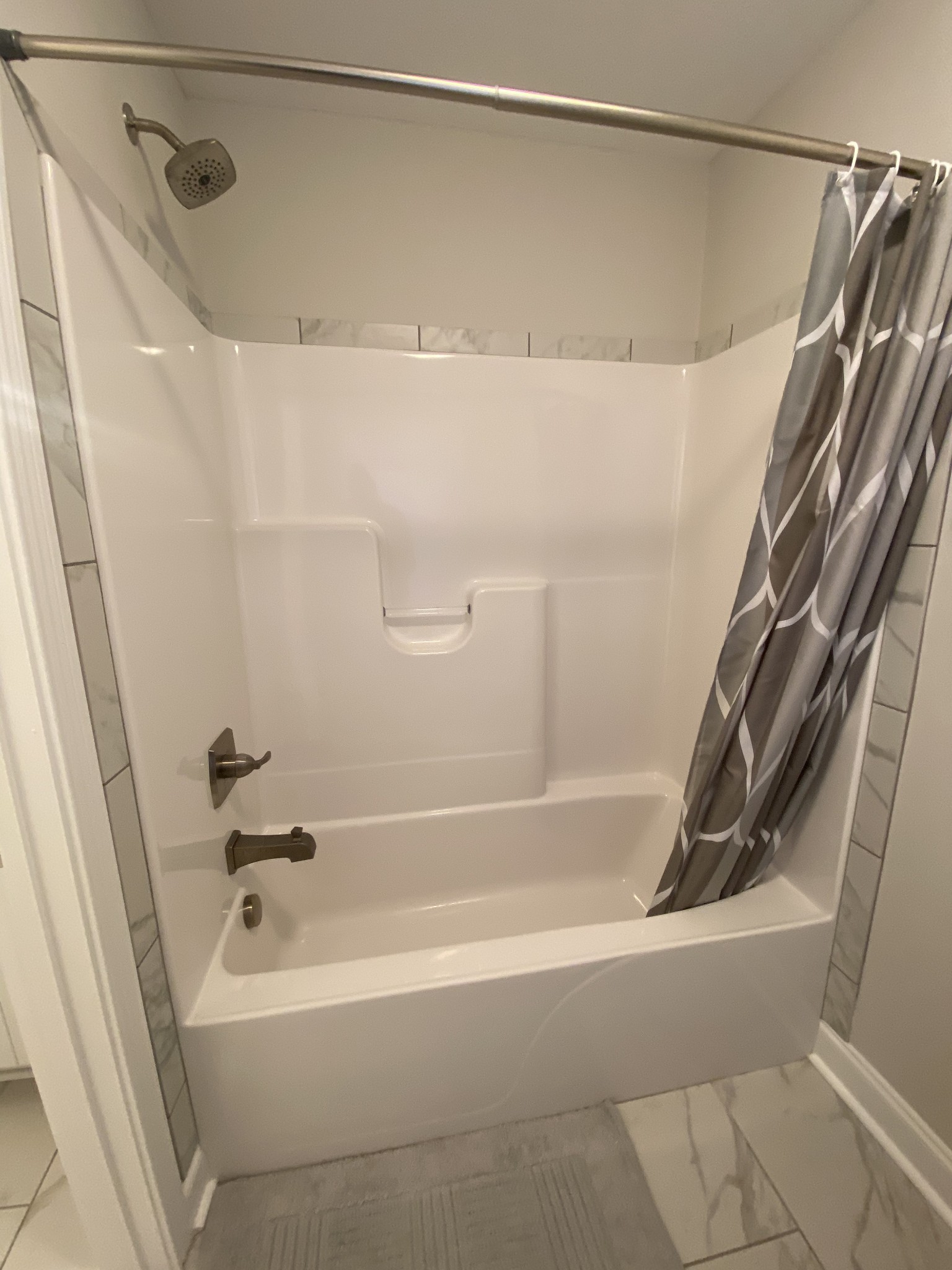 557 Dexter Drive Clarksville, TN 37043 - Photo 25 of 30 a bathroom with a shower and a bath tub