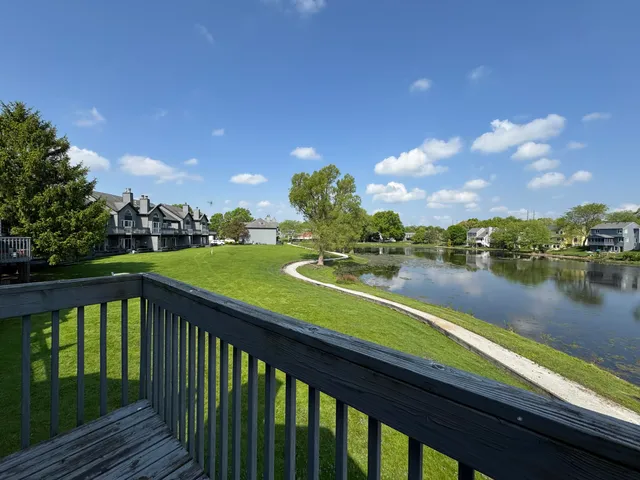 a view of swimming pool from a balcony