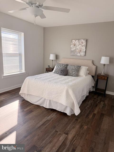 836 Bennett Street Wilmington, DE 19801 - Photo 23 of 66 a bedroom with a bed and wooden floor