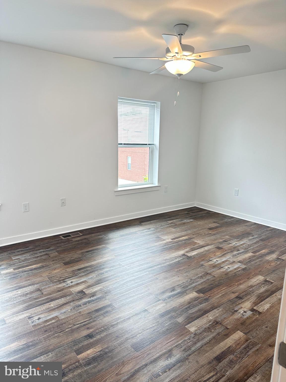836 Bennett Street Wilmington, DE 19801 - Photo 25 of 66 wooden floor in an empty room with a window