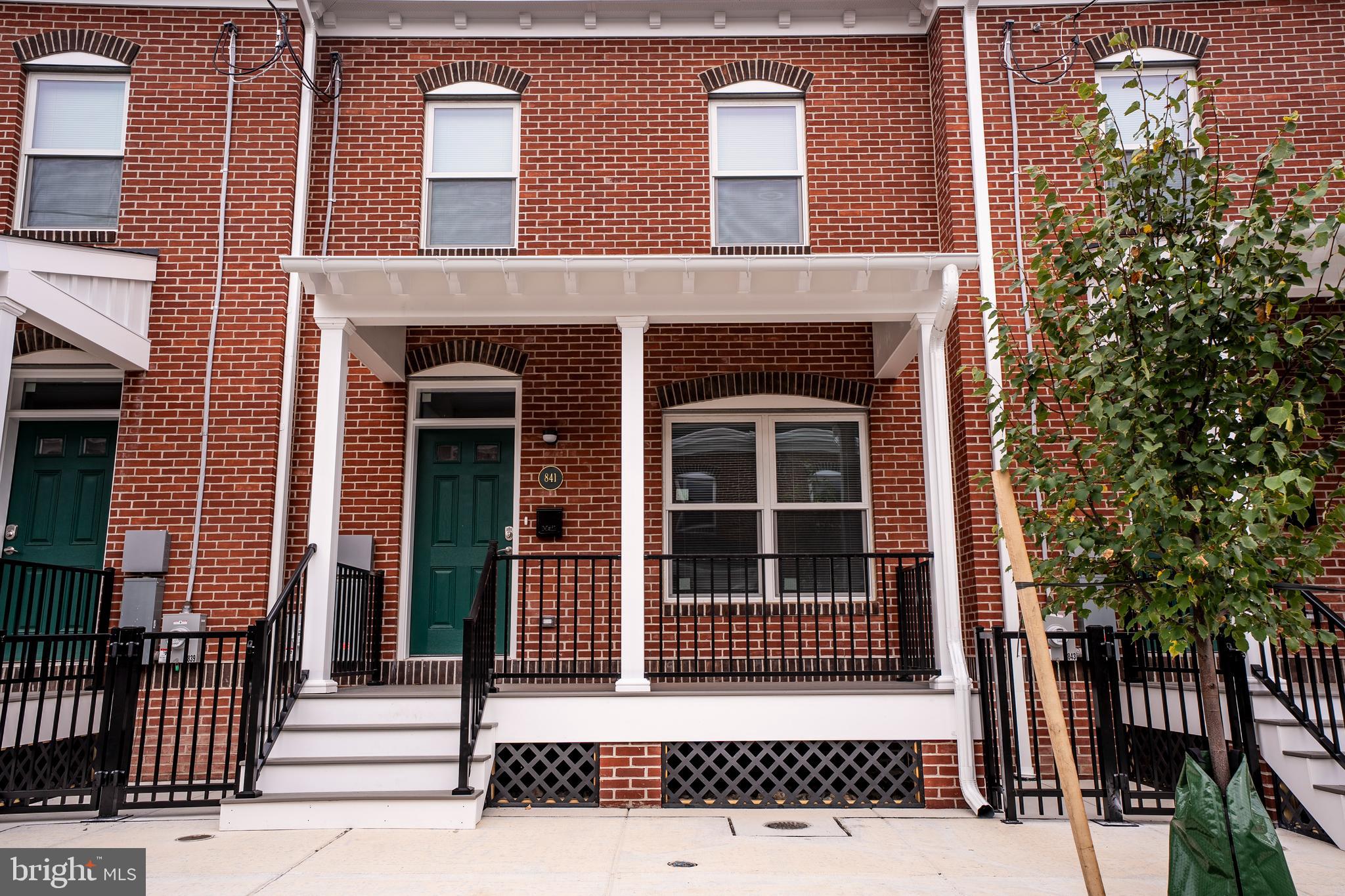 836 Bennett Street Wilmington, DE 19801 - Photo 3 of 66 a view of a brick house with a large window