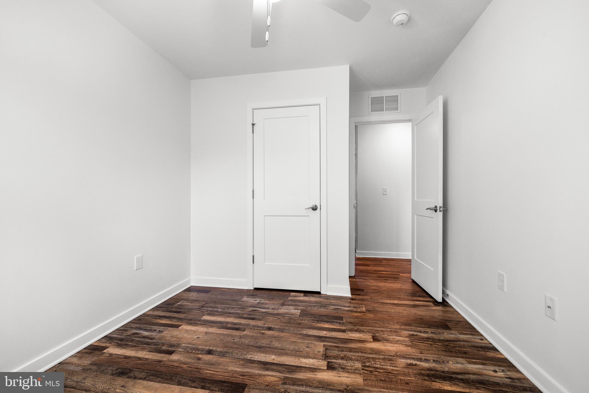 836 Bennett Street Wilmington, DE 19801 - Photo 49 of 66 a view of a room with wooden floor