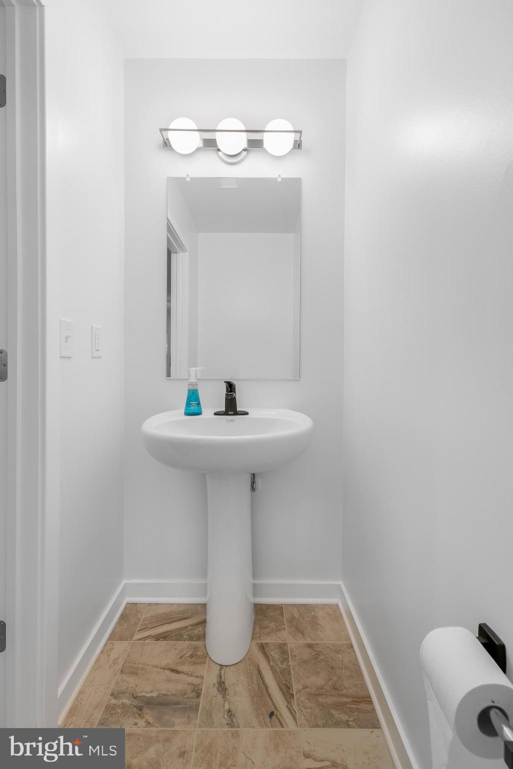 836 Bennett Street Wilmington, DE 19801 - Photo 56 of 66 a bathroom with a sink