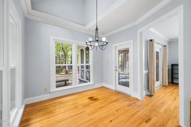 a white bath tub sitting next to a window