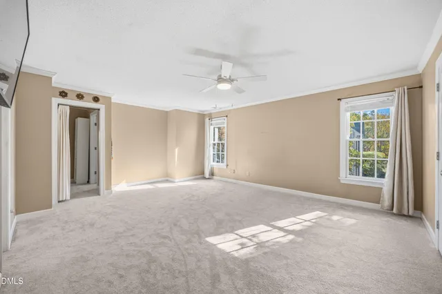 a front view of a house with a yard and pathway