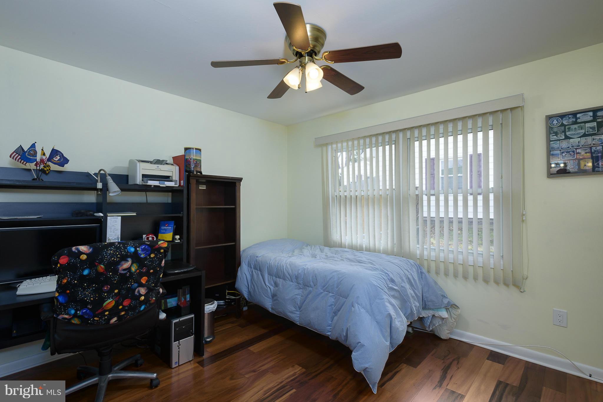 12013 Marvel Lane Bowie, MD 20715 - Photo 20 of 22 a bedroom with bed chair and a window