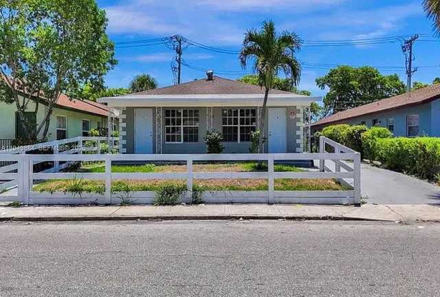 a view of a house with a swimming pool