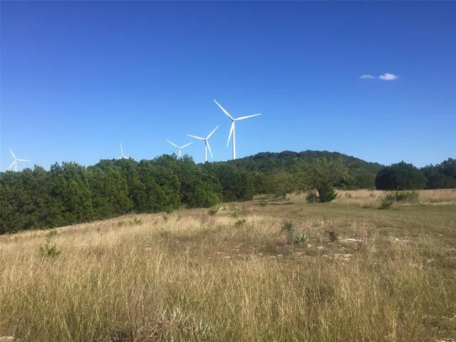 a view of mountain with lake view