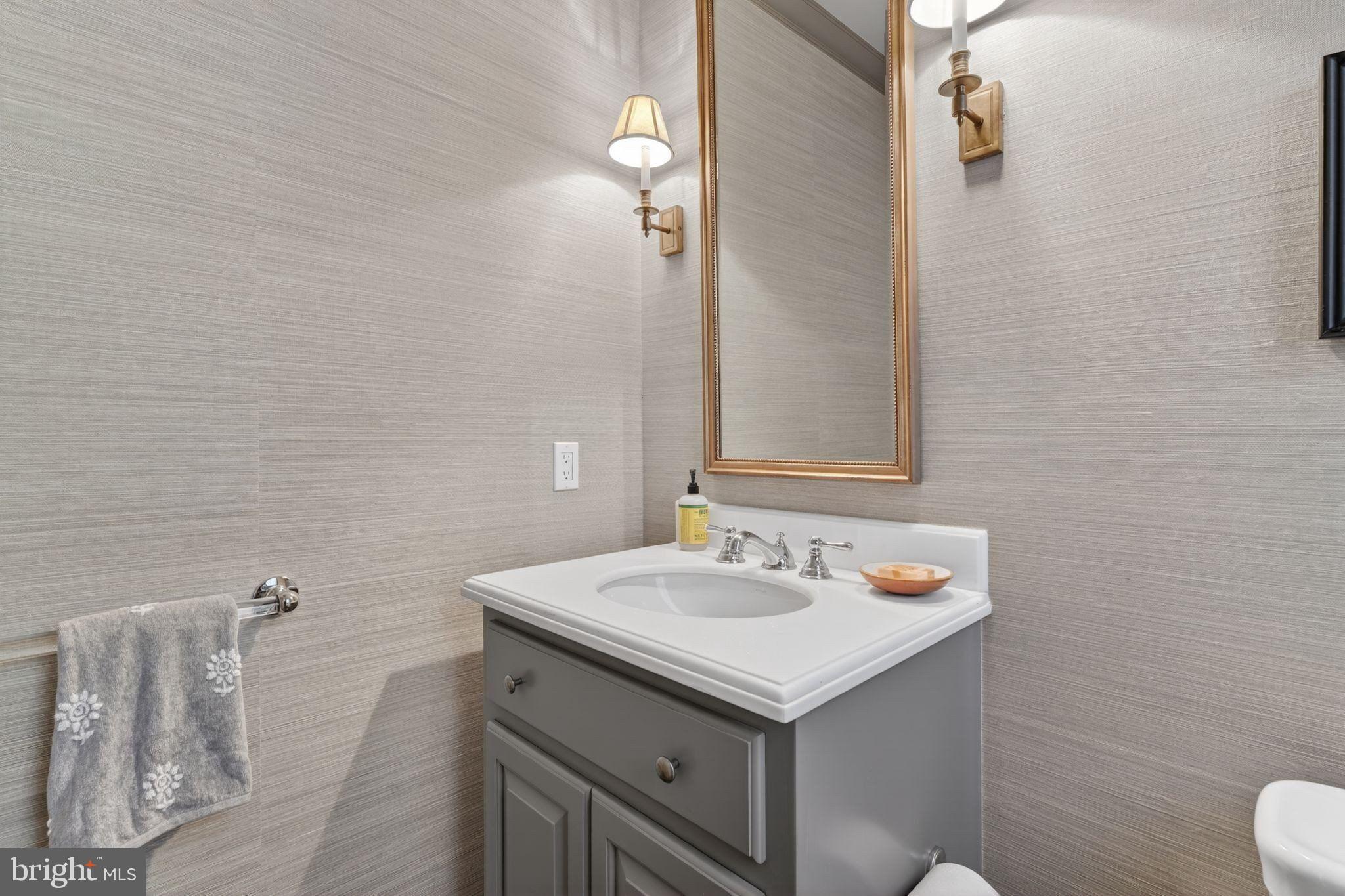 4340 Garfield Street Northwest Washington, DC 20007 - Photo 17 of 42 a bathroom with a sink and a mirror