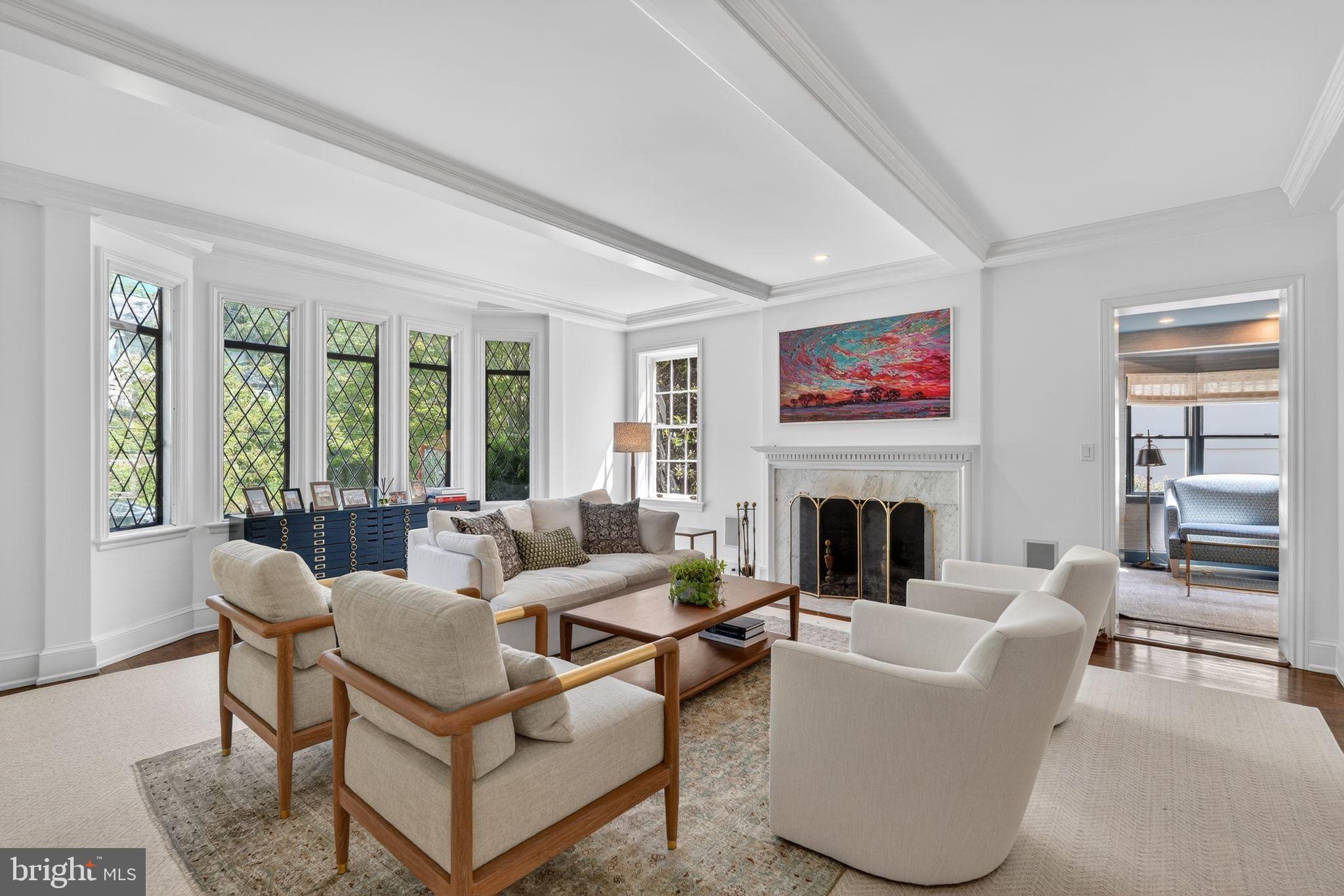 4340 Garfield Street Northwest Washington, DC 20007 - Photo 3 of 42 a living room with fireplace furniture and floor to ceiling windows