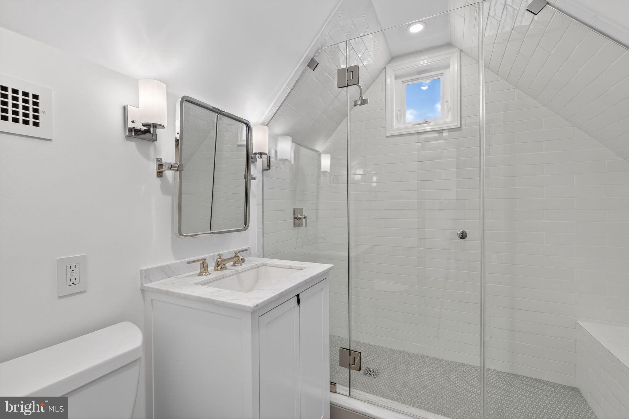 4340 Garfield Street Northwest Washington, DC 20007 - Photo 33 of 42 a bathroom with a sink toilet and shower
