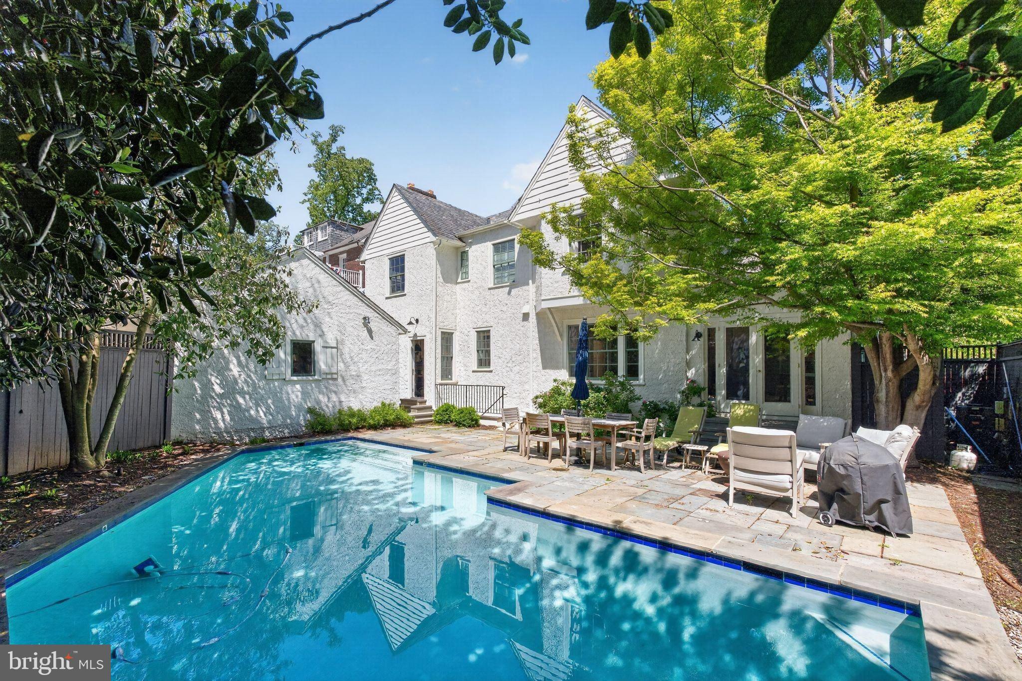 4340 Garfield Street Northwest Washington, DC 20007 - Photo 40 of 42 a view of a house with pool and sitting area