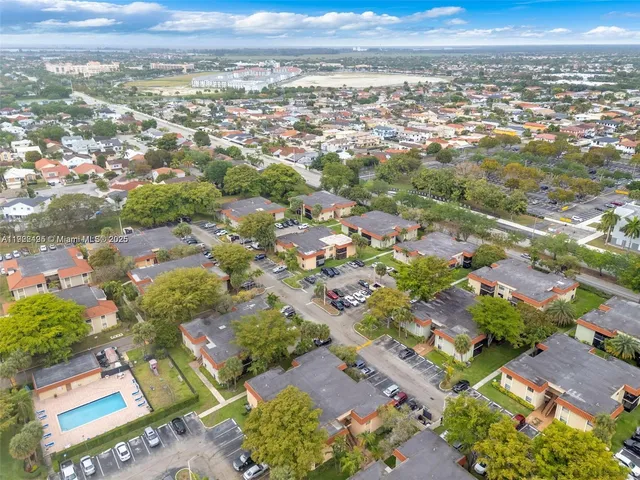 a room with gym equipment and a flat screen tv