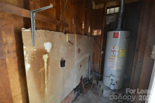 a bathroom with a shower and a sink