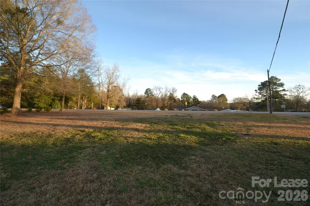a view of lake with green space