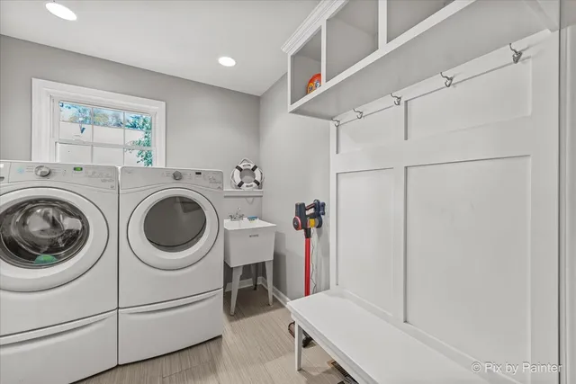 a utility room with dryer and washer