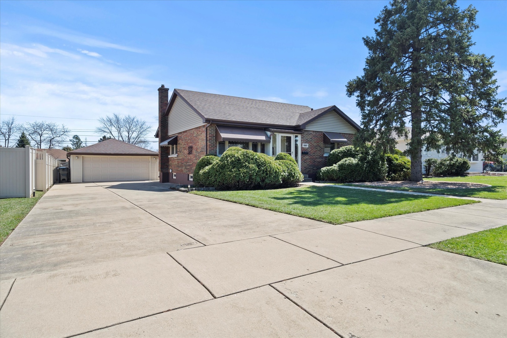 11007 Major Avenue Chicago Ridge, IL 60415 - Photo 1 of 21 front view of a house with a yard