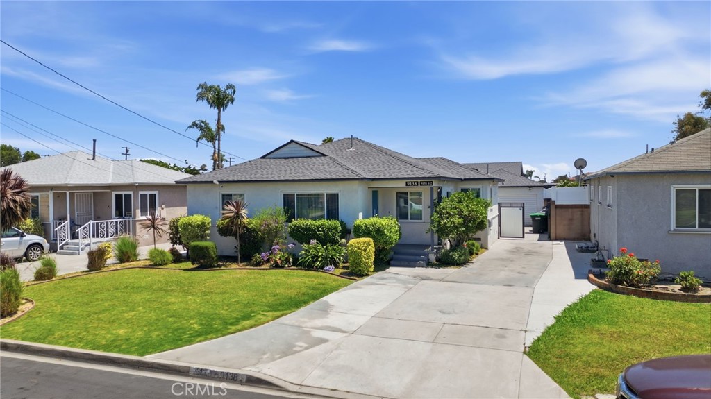 9138 Rendalia Street Bellflower, CA 90706 - Photo 3 of 11 Long driveway with room for RV parking