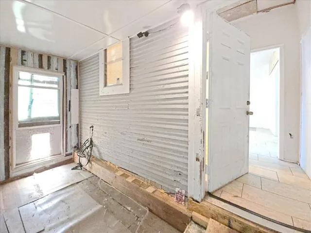 a view of a livingroom with wooden floor