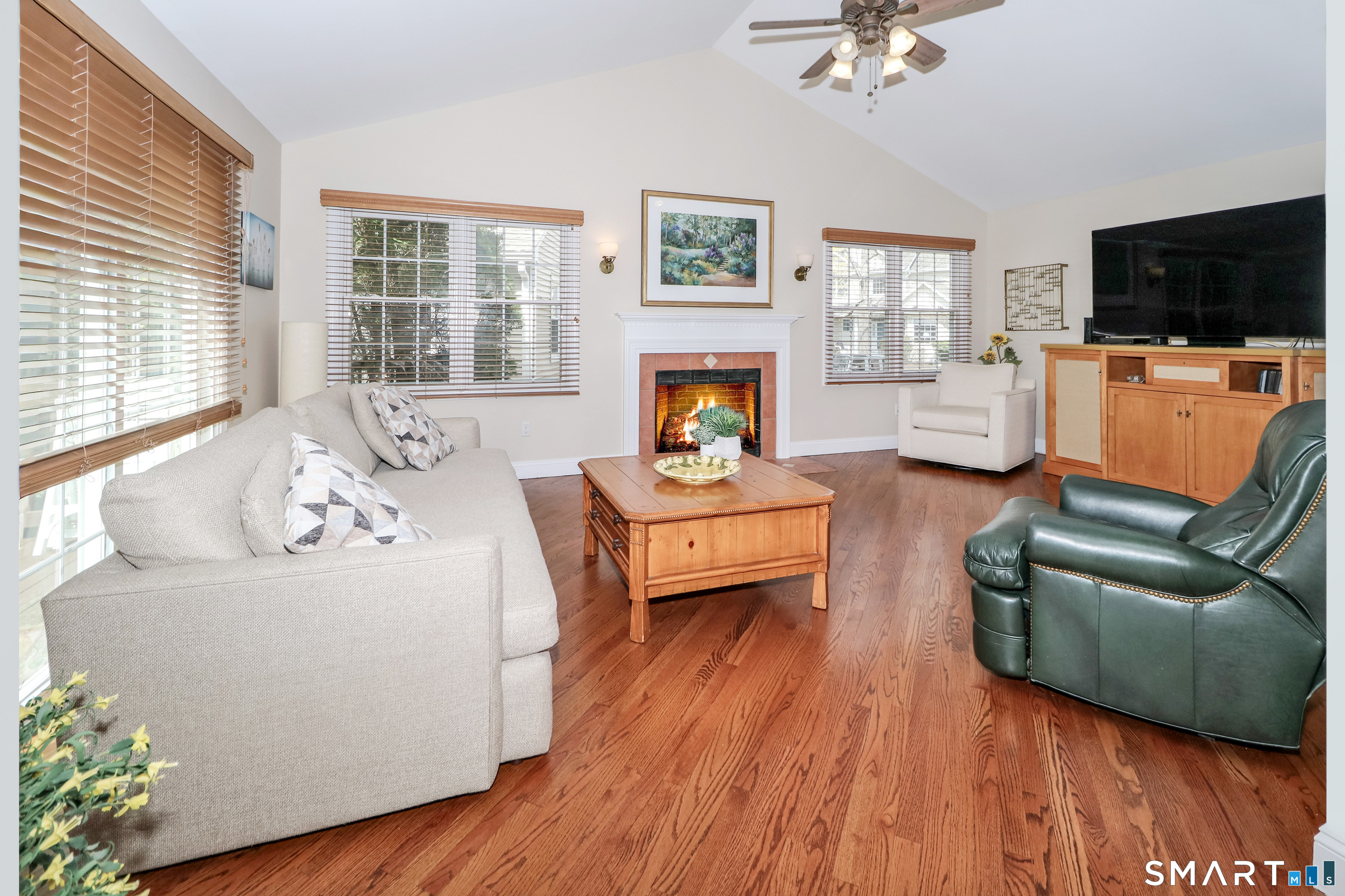 415 Pitkin Hollow, Unit 415 Trumbull, CT 06611 - Photo 12 of 35 Living room with fireplace