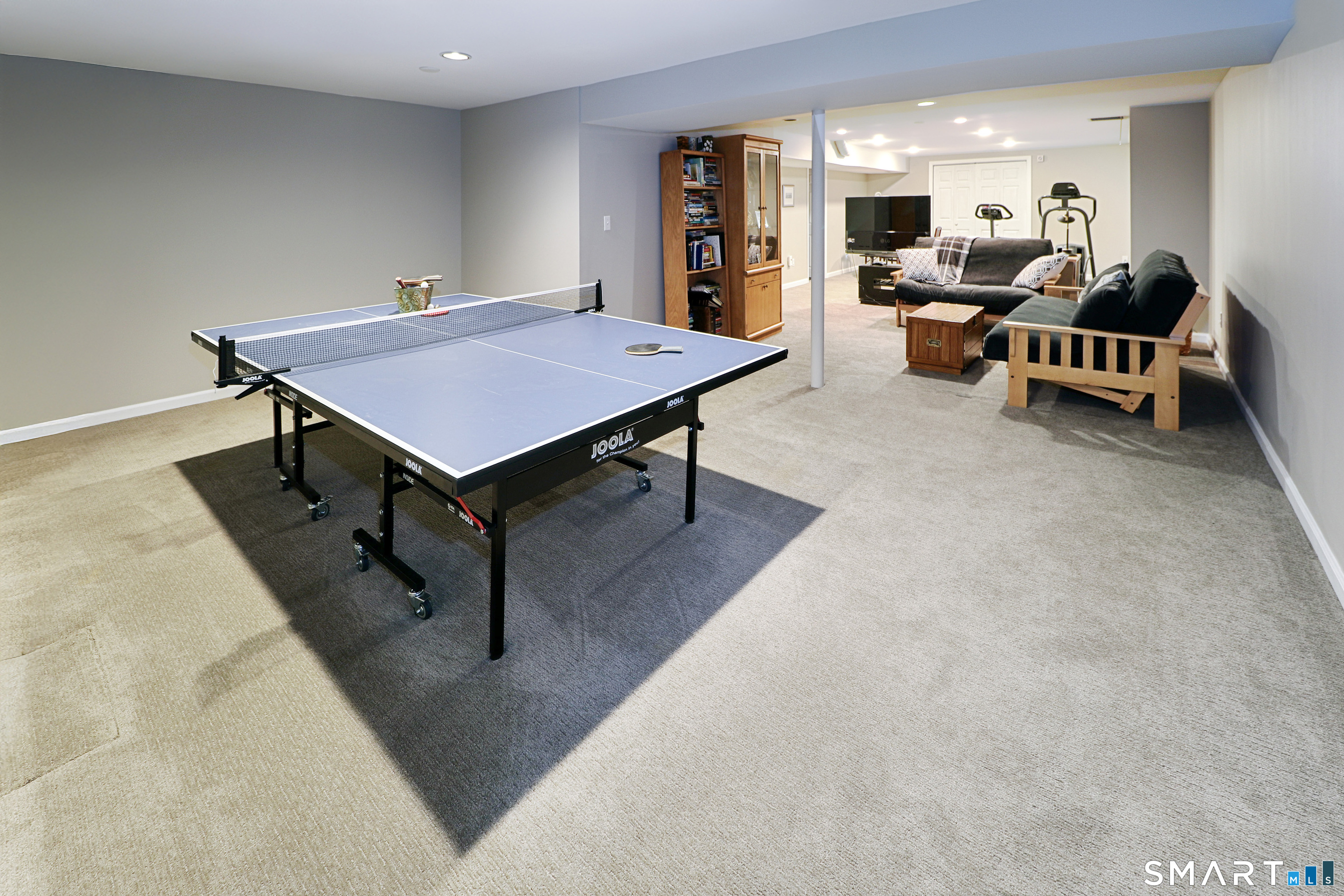 415 Pitkin Hollow, Unit 415 Trumbull, CT 06611 - Photo 24 of 35 Finished basement with wall to wall carpet
