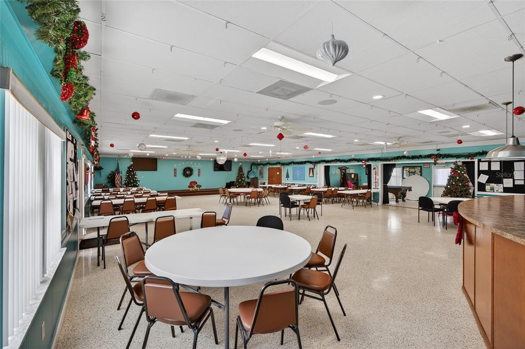 9238 140th Lane Seminole, FL 33776 - Photo 30 of 36 a view of a dining room with furniture