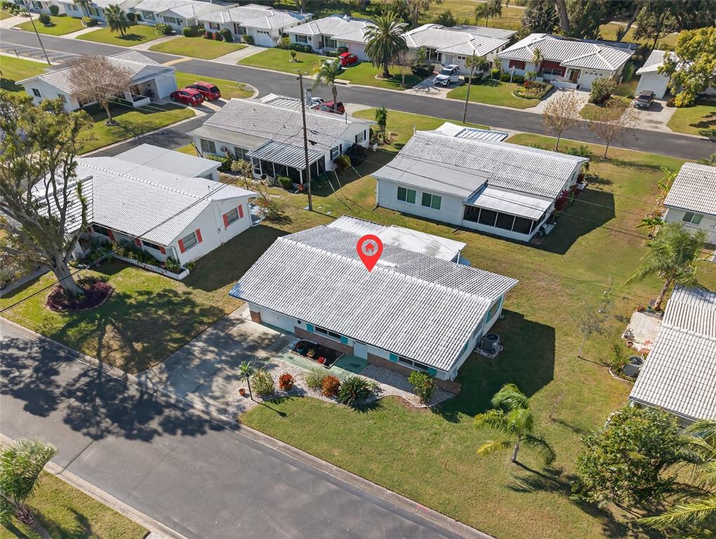 9238 140th Lane Seminole, FL 33776 - Photo 3 of 36 an aerial view of residential houses with outdoor space