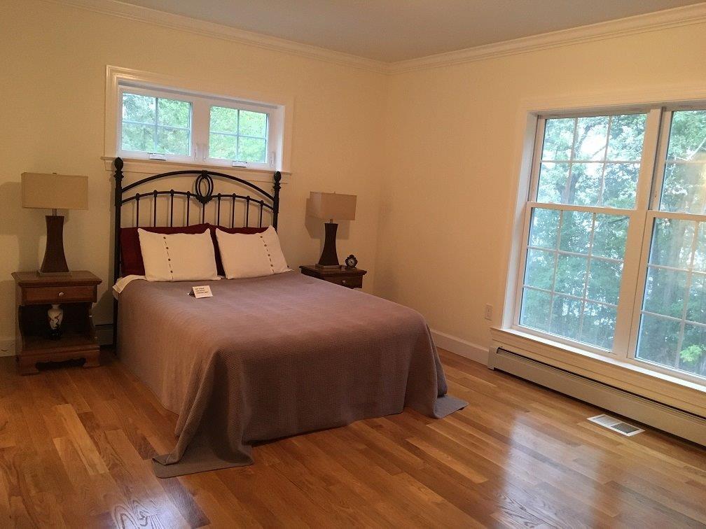 76 Pimlico Pond Road Mashpee, MA 02649 - Photo 9 of 35 a bedroom with a bed and a window