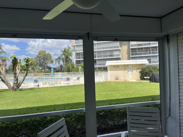 a view of a door and an outside view of the house