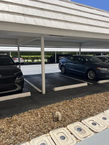 an aerial view of a house with a garden