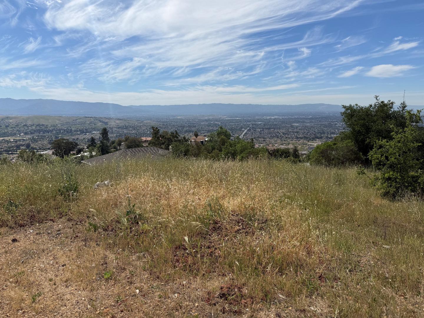 4152 Aborn Road San Jose, CA 95135 - Photo 7 of 8 a view of a lake with houses in the back